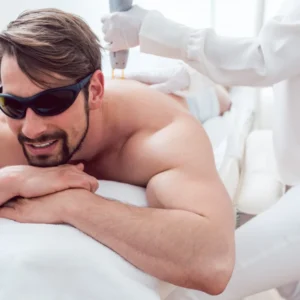 Man Under Treatment In A Hair Removal Studio-scaled